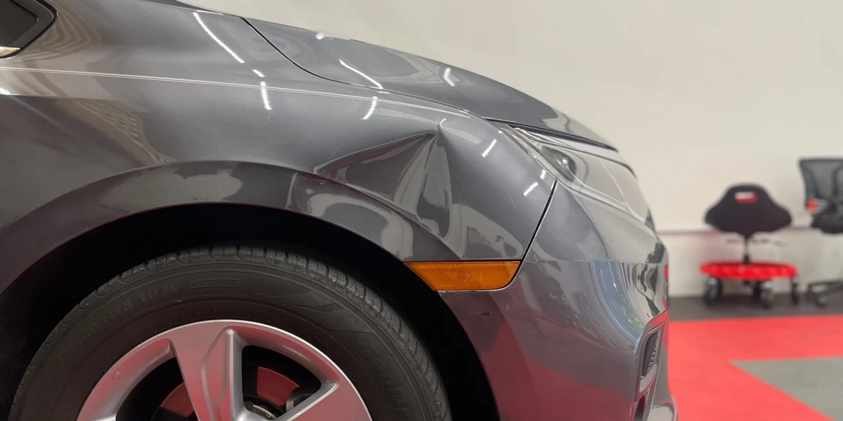 Fender Dent Repair before repair