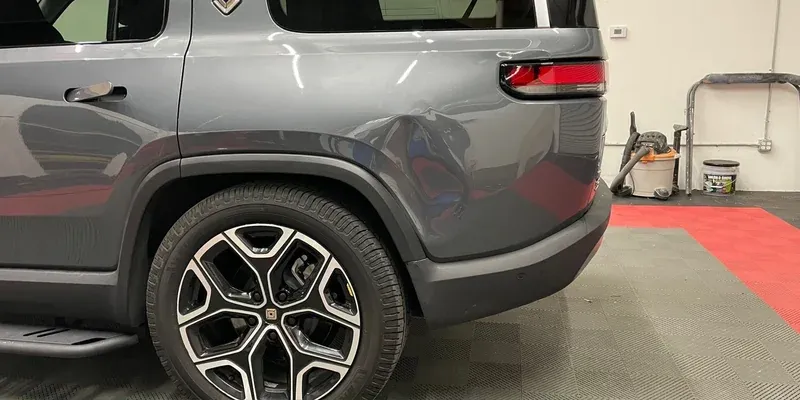 Rivian · Rear Quarter before repair